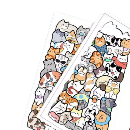 Två pusselbitar med tecknade katter ur ett träpussel