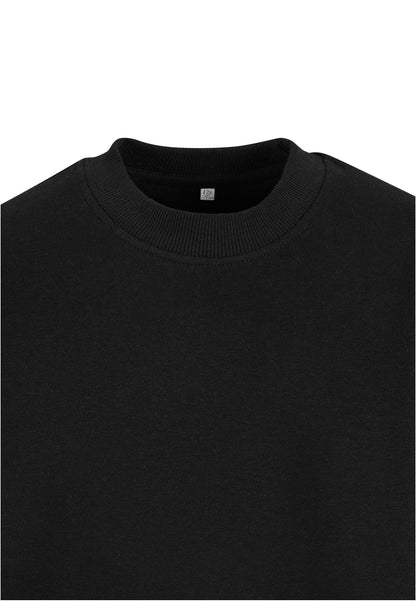 UC Boys Light Terry Crew i färgen black - barnkläder från Happy Parent
